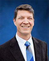 Headshot of Raymond Crews